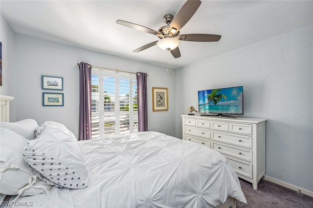 bedroom featuring ceiling fan and dark carpet