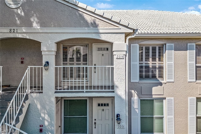 exterior space featuring a balcony