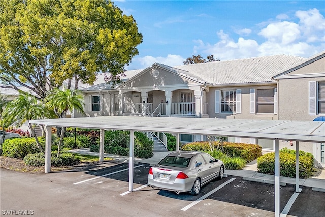 view of parking with a carport