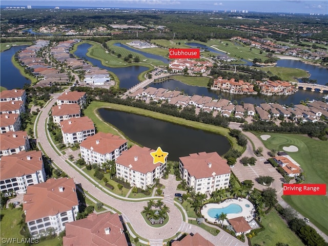 birds eye view of property with a water view