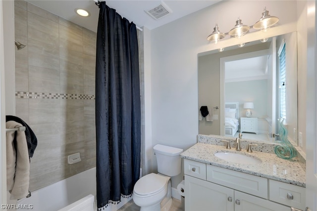 full bathroom featuring shower / bath combination with curtain, oversized vanity, and toilet