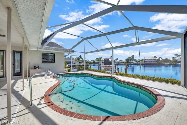 view of swimming pool with glass enclosure, a water view, a patio, and a boat dock