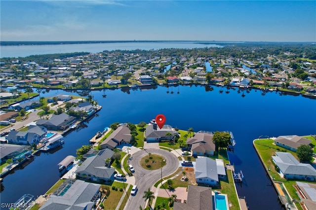 bird's eye view with a water view