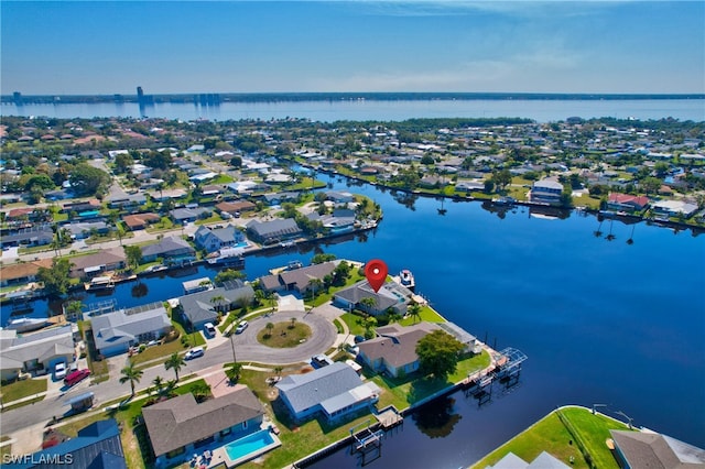 drone / aerial view featuring a water view