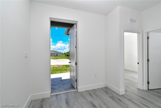 foyer entrance featuring light hardwood / wood-style flooring