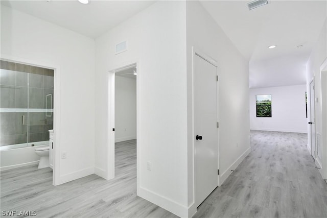 hall featuring light hardwood / wood-style floors