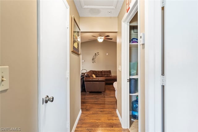 hall with dark hardwood / wood-style flooring