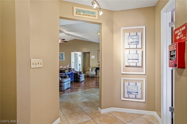 corridor with light tile flooring