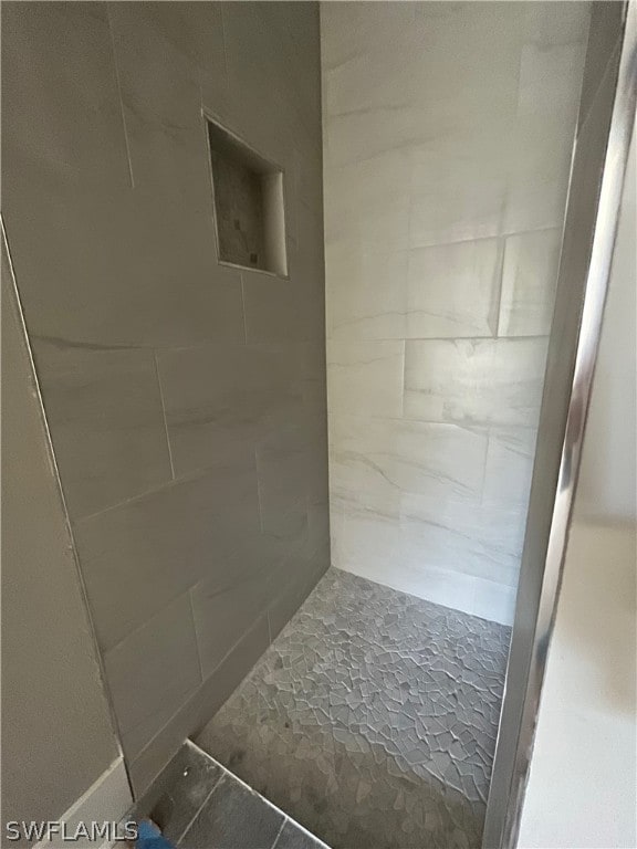 bathroom with a shower