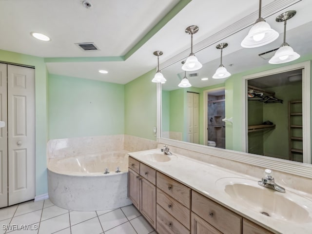 bathroom featuring separate shower and tub, tile patterned flooring, and vanity