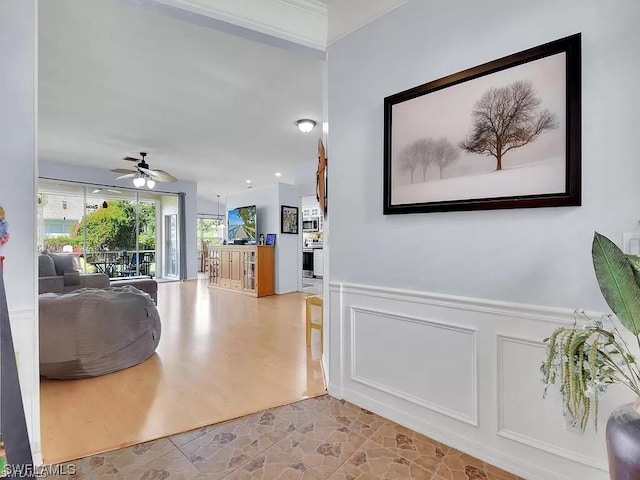 interior space featuring ceiling fan