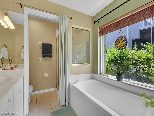 full bathroom featuring shower with separate bathtub, toilet, vanity, and tile flooring