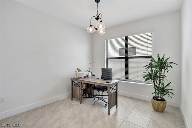 tiled office space with an inviting chandelier