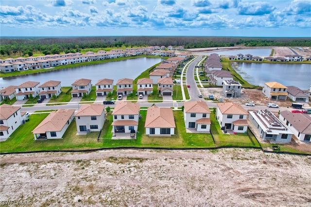 drone / aerial view featuring a water view