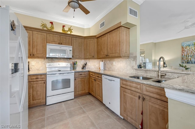 kitchen with backsplash, white appliances, ceiling fan, and light stone counters