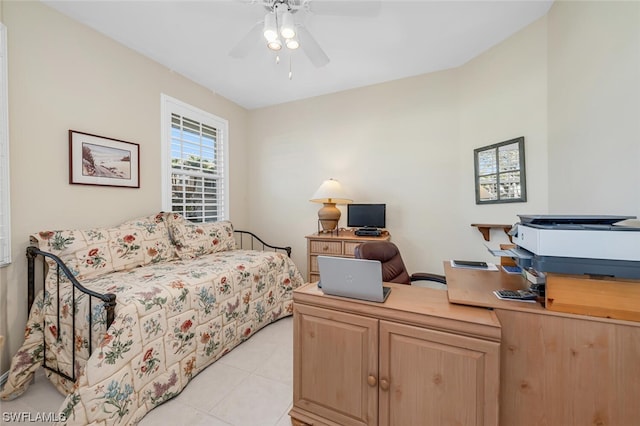 bedroom featuring light tile floors and ceiling fan