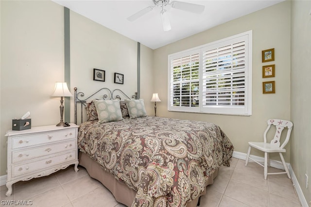 bedroom featuring light tile flooring and ceiling fan