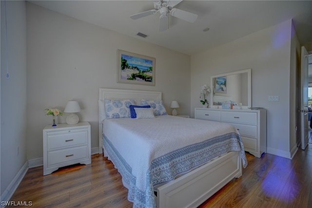 bedroom featuring hardwood / wood-style floors and ceiling fan