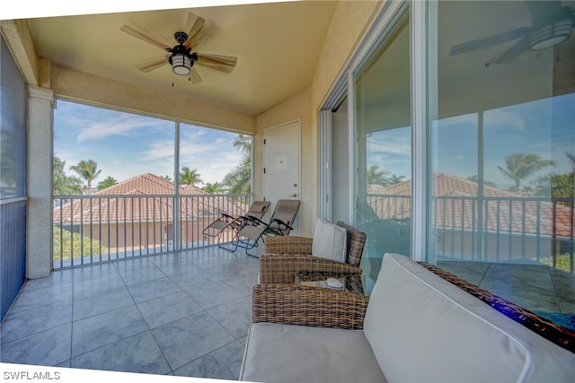 exterior space featuring ceiling fan