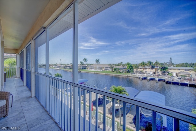 balcony featuring a water view