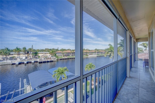 balcony featuring a water view