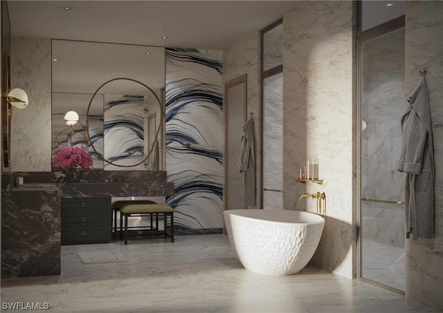 interior space featuring a marble finish shower, a freestanding bath, stone wall, marble finish floor, and vanity