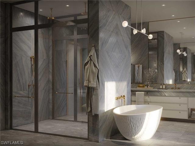 full bath featuring a shower stall, a freestanding bath, and vanity