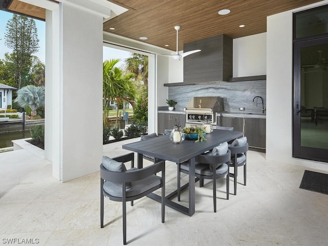 exterior space with sink, wood ceiling, and plenty of natural light