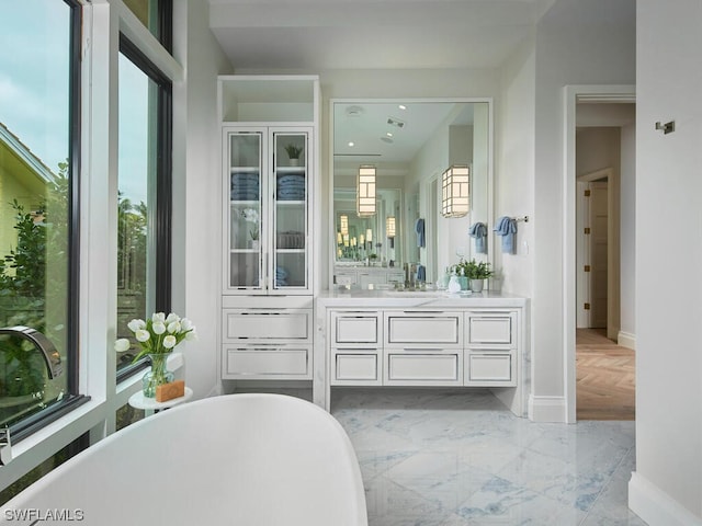 bathroom featuring vanity and a bathing tub