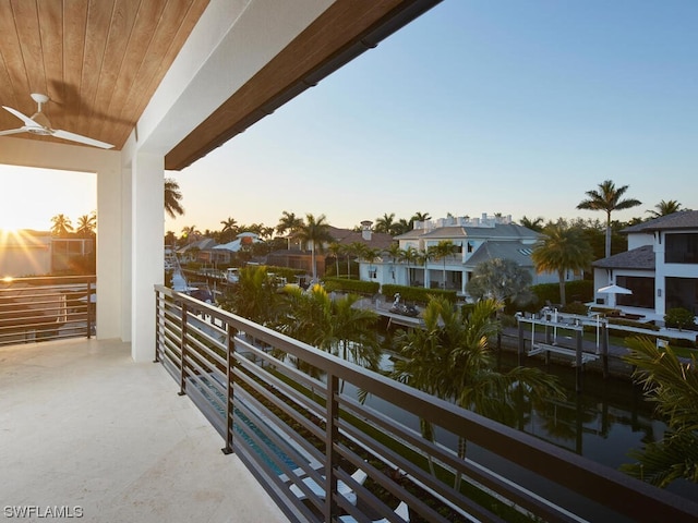 balcony at dusk with ceiling fan