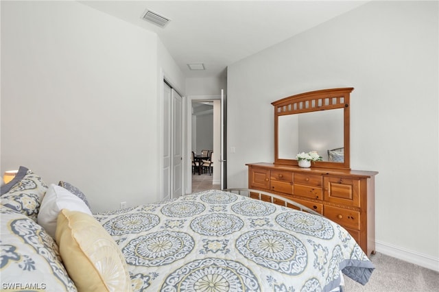 bedroom featuring carpet floors and a closet