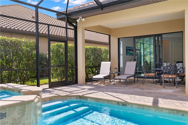 view of swimming pool featuring a patio area