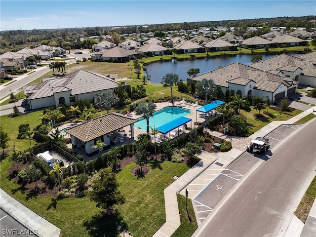 drone / aerial view with a water view