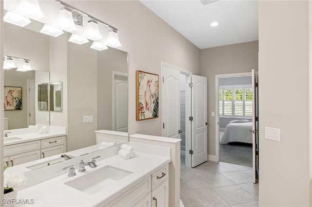 bathroom with vanity and tile patterned floors