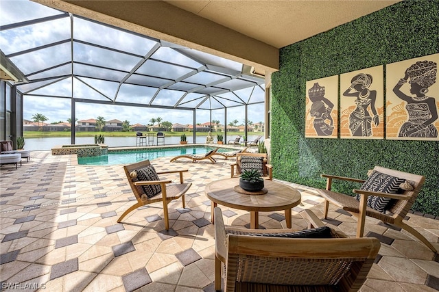 view of swimming pool with glass enclosure and a patio