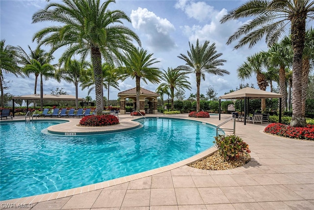 view of pool with a patio and a gazebo