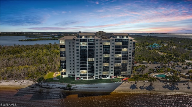 outdoor building at dusk with a water view