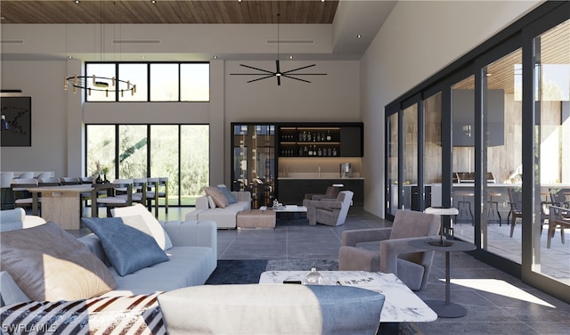 tiled living room featuring ceiling fan, wood ceiling, and a high ceiling