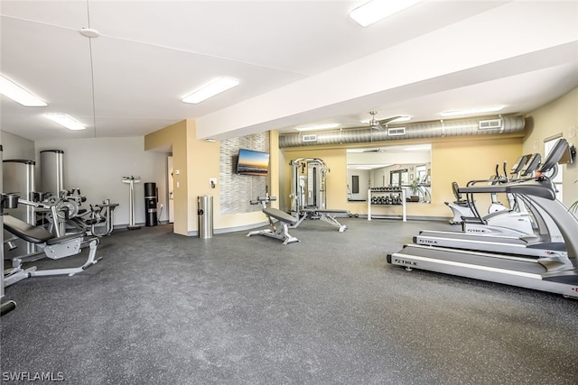 workout area featuring ceiling fan