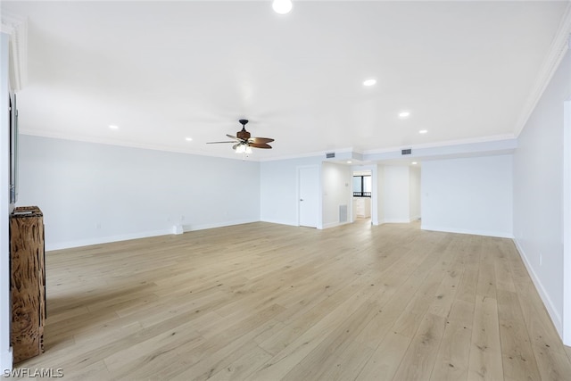 unfurnished living room with light hardwood / wood-style flooring, ceiling fan, and crown molding