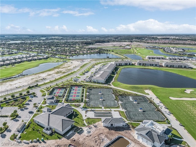 bird's eye view with a water view