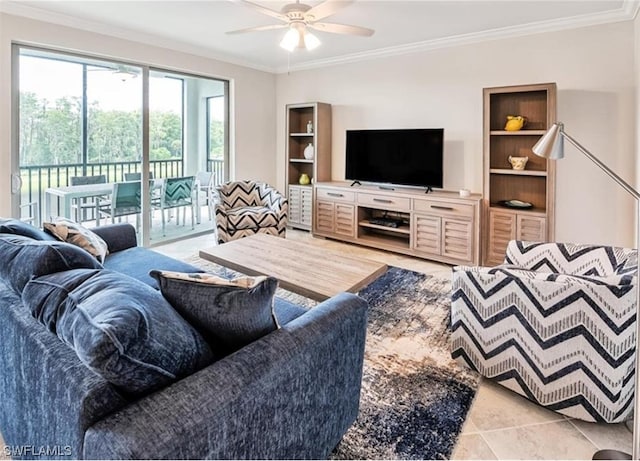 living room with ceiling fan, crown molding, and light tile floors