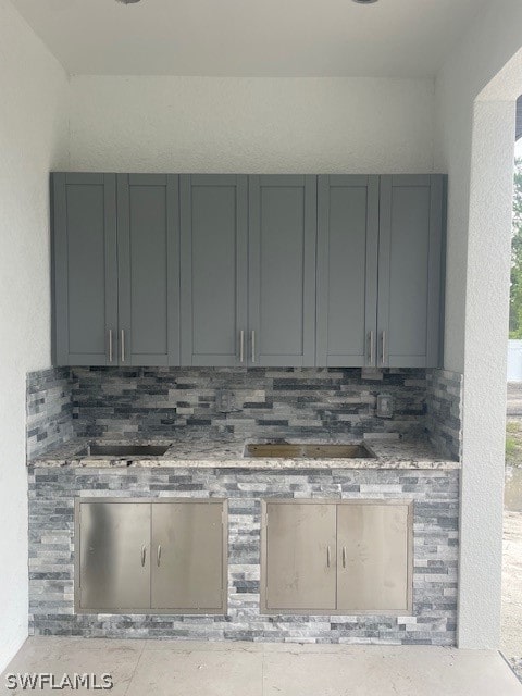 kitchen with tasteful backsplash