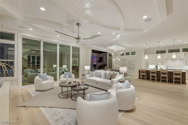 living room featuring beam ceiling, light wood-type flooring, ceiling fan, and wood ceiling