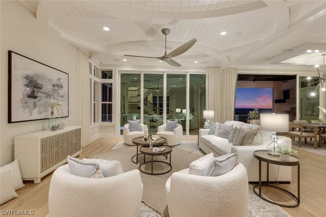 living room with beamed ceiling, light hardwood / wood-style floors, ceiling fan, and wood ceiling