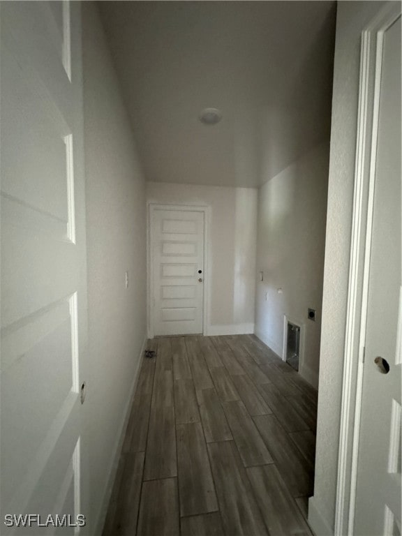 hallway featuring dark hardwood / wood-style floors