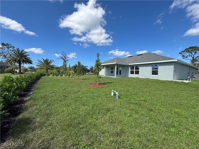 exterior space with a lawn