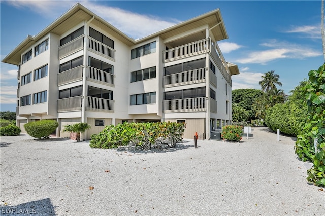 view of property featuring central air condition unit