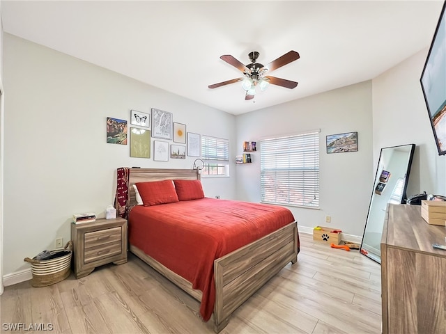 bedroom featuring ceiling fan and light wood-type flooring