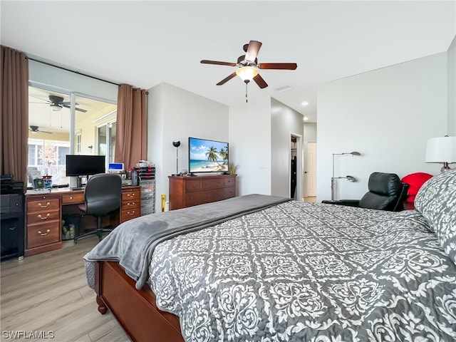 bedroom featuring a closet, ceiling fan, and light hardwood / wood-style flooring